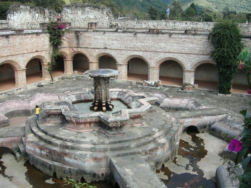 Antigua Guatemala -Within the ruined Merced Cloister stands enormous Fuente de Pescados (Fountain of the Fish), reputedly named for the fish-breeding experiments done there by the Mercedarian brothers. This is largest of Antigua's many fountains, with a diameter of over 80 feet by geocheb