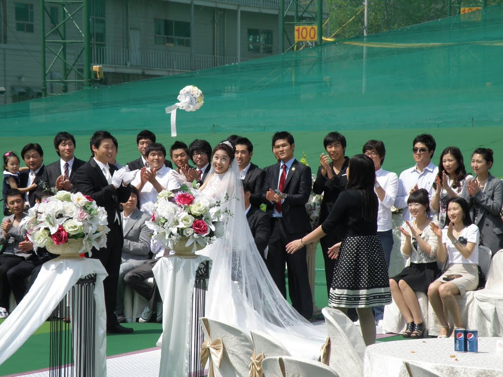 Okay!Who's ready to catch the bouquet? by stephan Seo