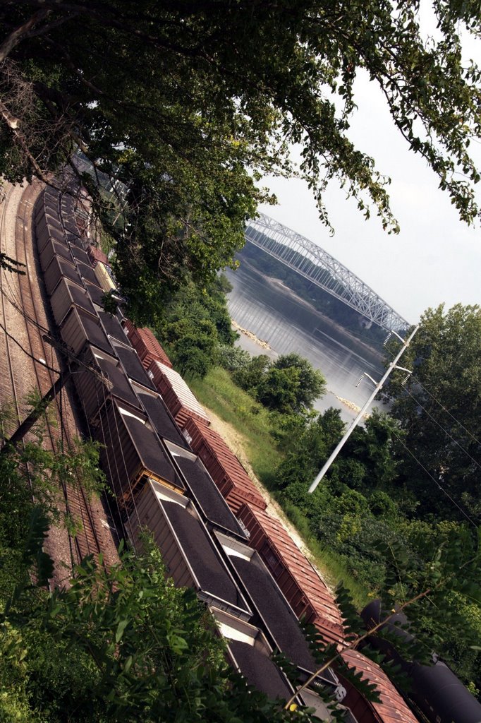 Coal cars by the river by Ryan Calhoun