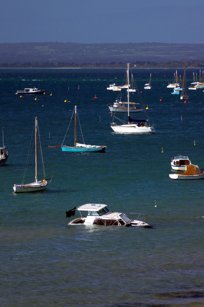 'The Wanderer' (in foreground) sits on a sandbar after sinking below the water line off Policeman's Point @ Sorrento (May, 2010) by Muzza from McCrae