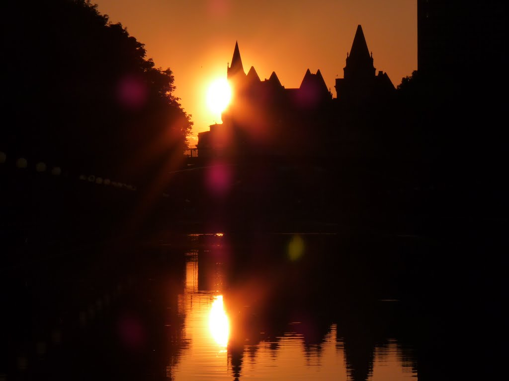 Sunset over Chateau Laurier and Rideau Canal in Ottawa by januszl