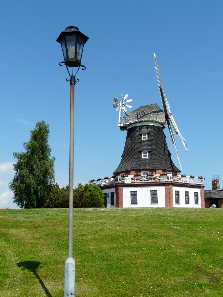 Germany_Mecklenburg_Klüz_dutch octagonal smock windmill with a revolving cap and platform_P1130354.JPG by George Charleston