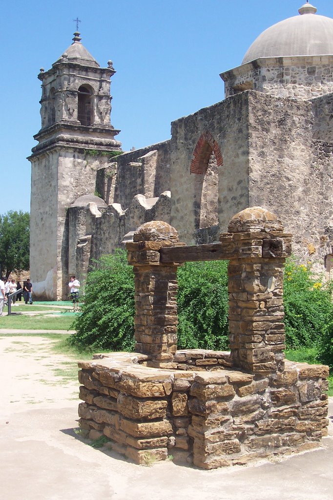 Well and Mission San José church by bmoses