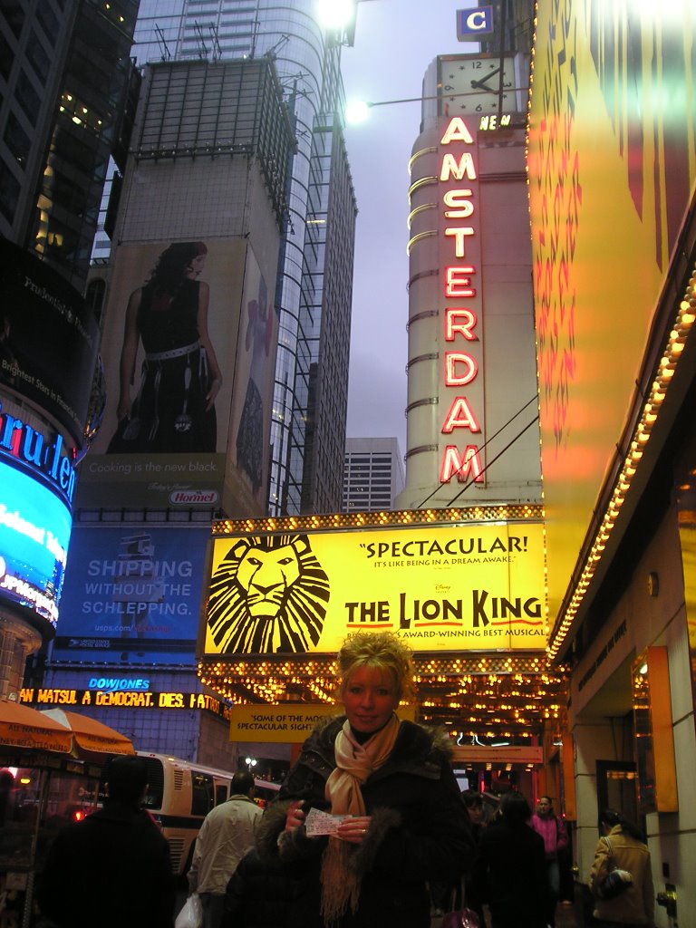 Broadway Chick - Lion King Tickets in hand by John Turner