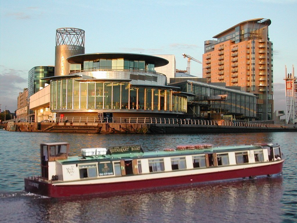 L.S. Lowry cruising past The Lowry Centre by City Centre Cruises