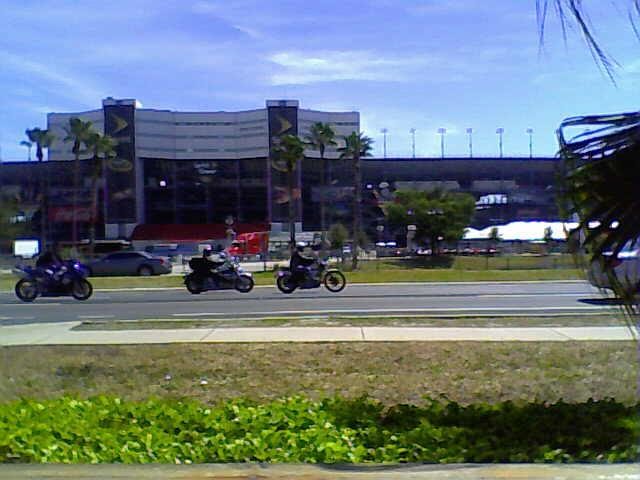 Departing bikers US 92 viewed from Hooters Daytona, part of speedway in background. Bikeweek 09 by iridethedragon3