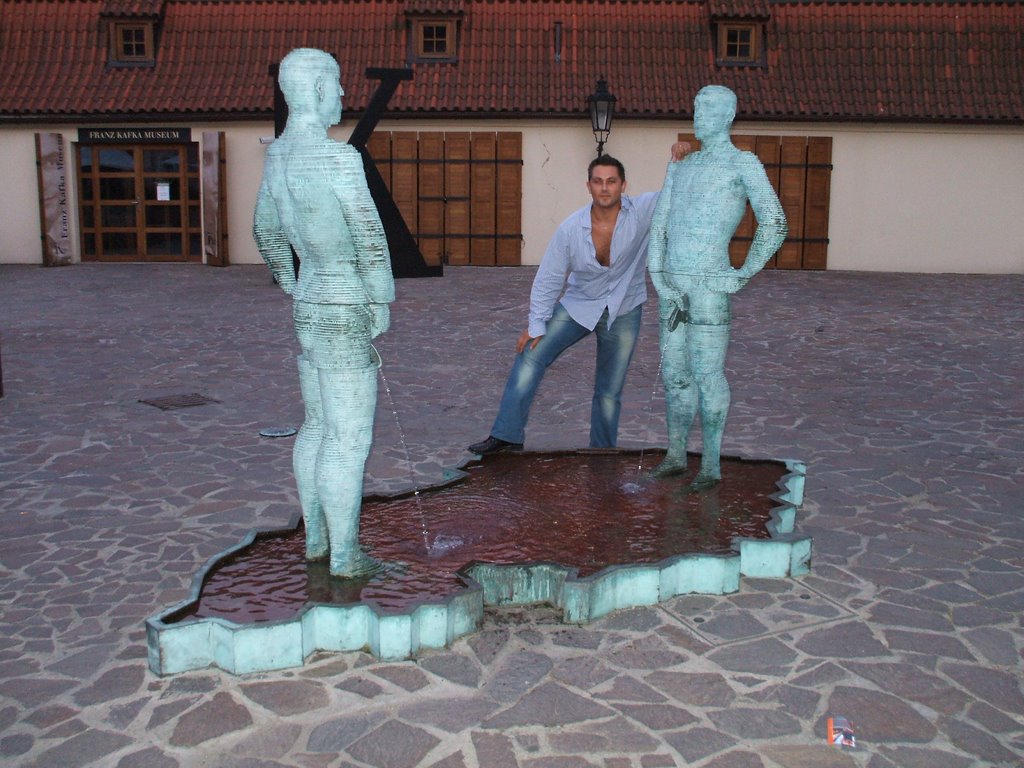 Eurocrats peeing on Czechia, Kafka Museum, Prague by Erdmann Rogge