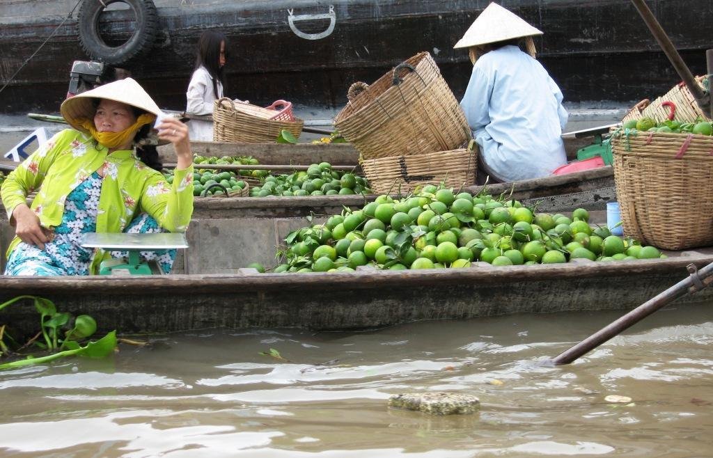 Phung Hiep floating market. Mekong delta. by Finnbar