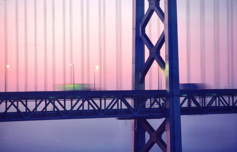 Criss Crosses: San Francisco--Oakland Bay Bridge at Dawn by Joe Gattuso