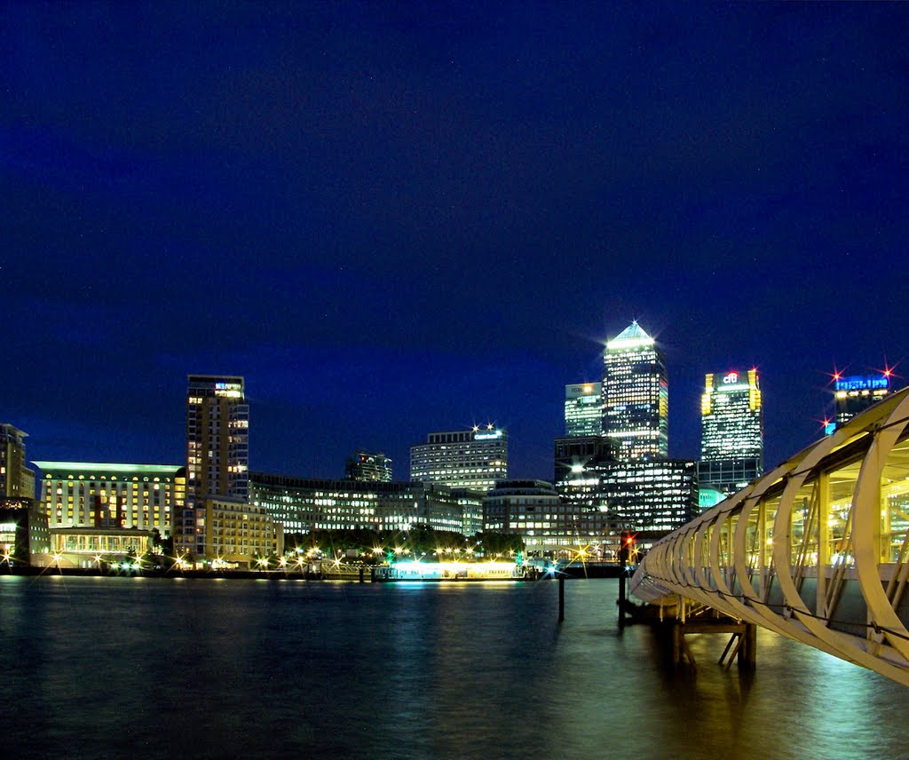 Piers of Hilton Docklands Riverside and Canary Wharf provide portage across the River Thames by Kevin Childress