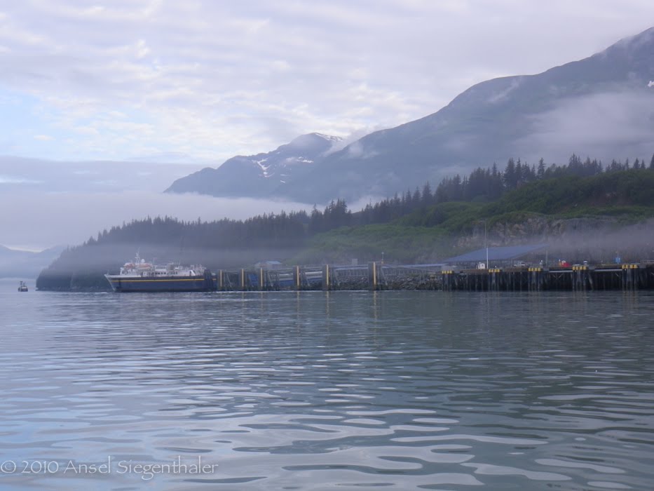 Ferry at dock in fog by Ansel Siegenthaler