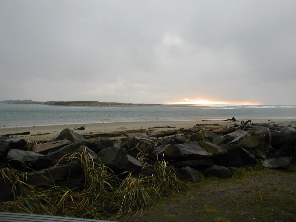 Sunset break over Siletz Bay by D. E. Wach