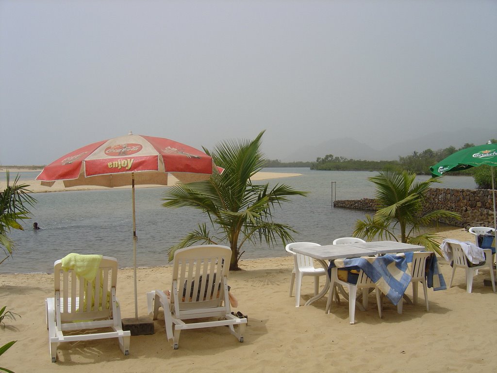 Relaxing at the beach Chez Franco by David Vaucher