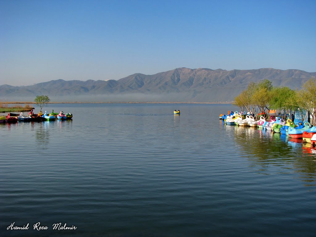 Boating on Zarivar Lake by Hamid Reza Malmir