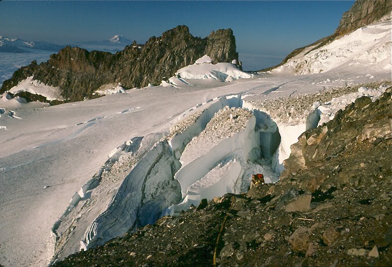 Cadaver Gap and Cathedral Rocks across the chaos of the Ingraham Glacier on Mt. Rainier by Joel Skok