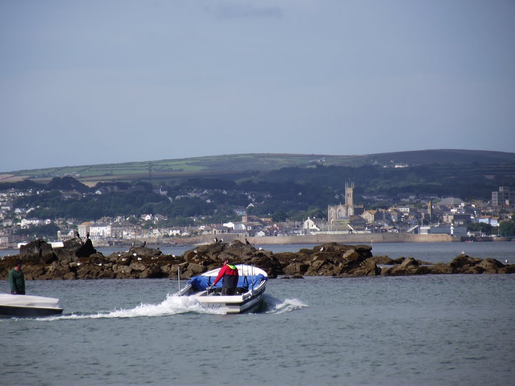 St Michaels Mount taxi Boat & Penzance in the background by Andrew Johnson