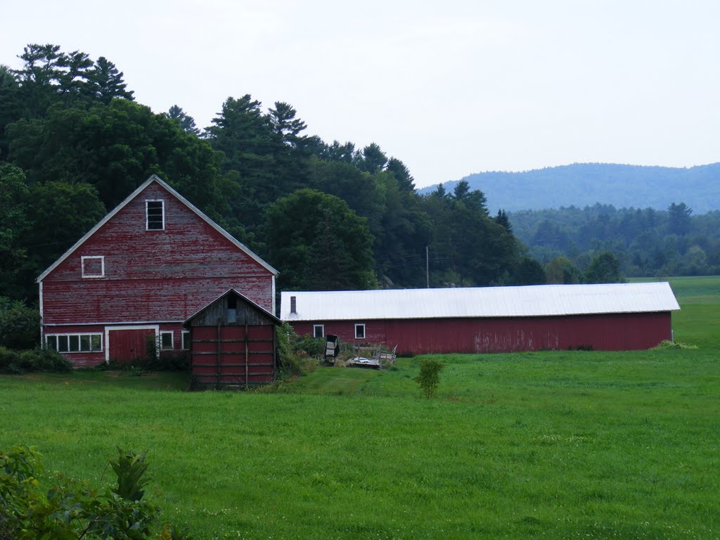 Weathered red barn by JBTHEMILKER