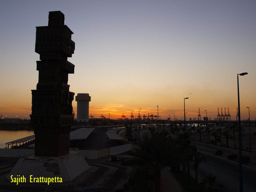 Sculpture, JPC tower, port & sunset by Sajith Erattupetta