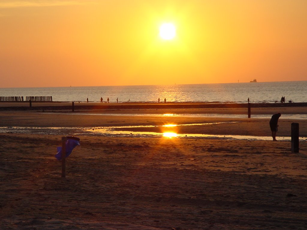 Sunset at beach Cadzand by Patrick van den Bigg…