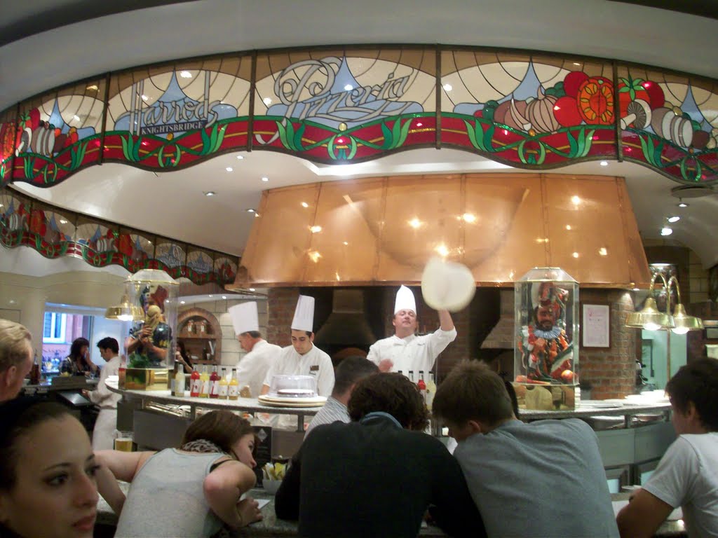 The man is singing(wonderfull)and making Pizza in Harrods by Jeanette @