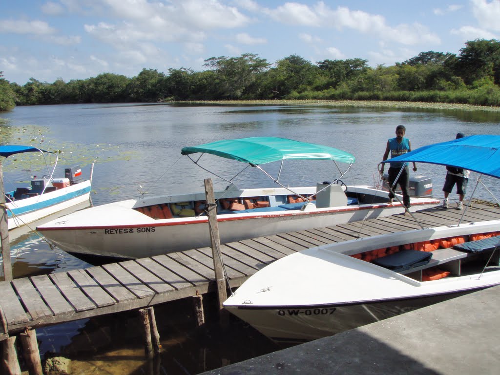 BELIZE: New River: Lamanai Tour Boat at Bound to Shine dock by Douglas W. Reynolds