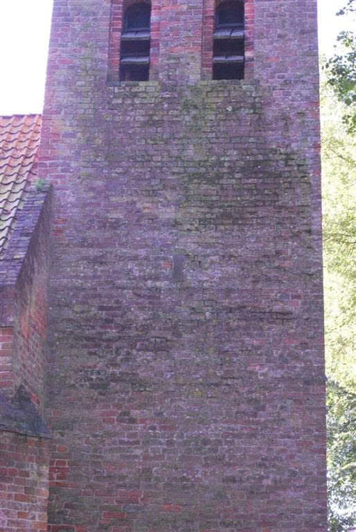 In het midden van de toren "Het stenen brood" - St. Bonifaciuskerk - Damwoude by Joe Cost Budde