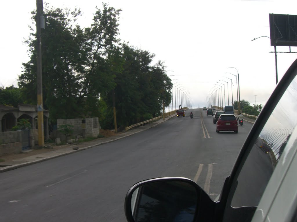 En Rumbo a Santo Domingo. Puente de San Pedro de Macoris. by Robert Lam