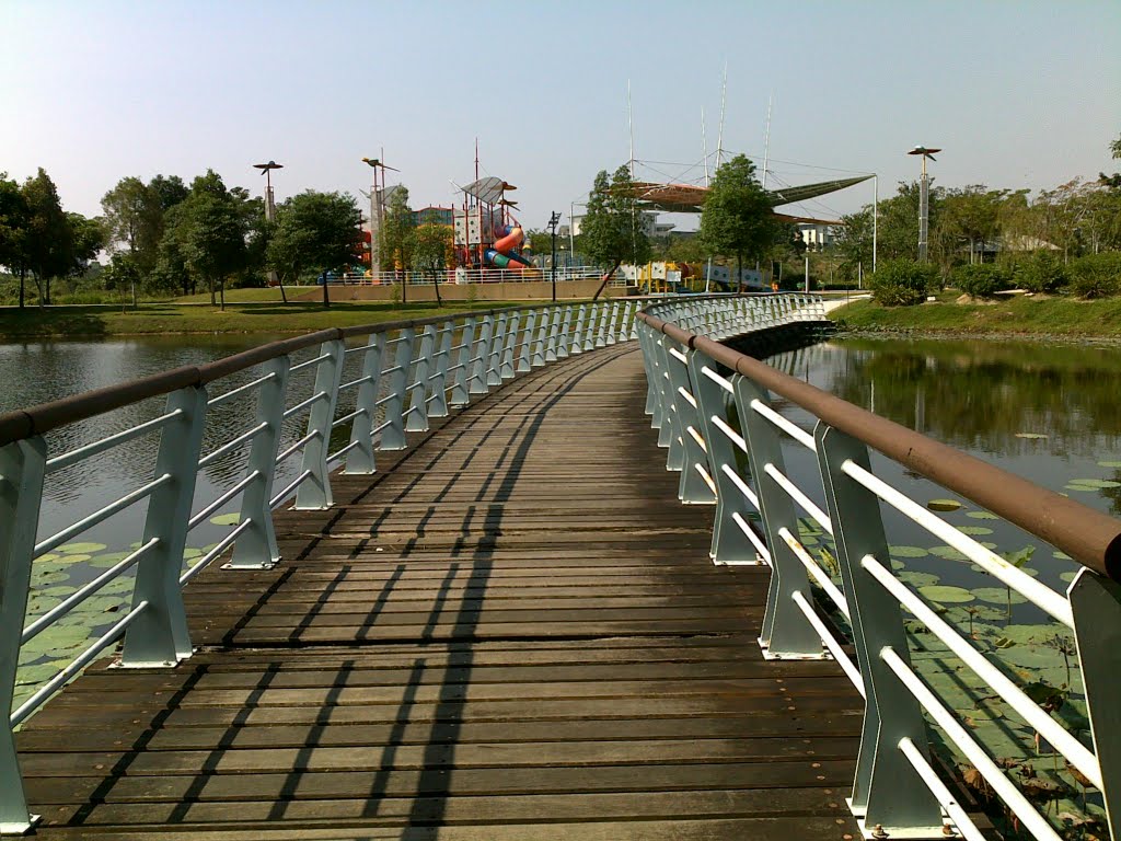 Bridge to artificial island by Cheen Siong