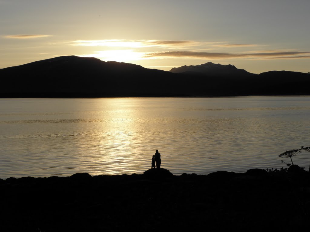 On a rock in sunset by Roald Ivar Thunberg