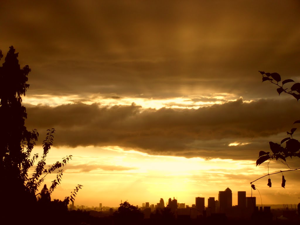 Sunset over the city by gordo1958