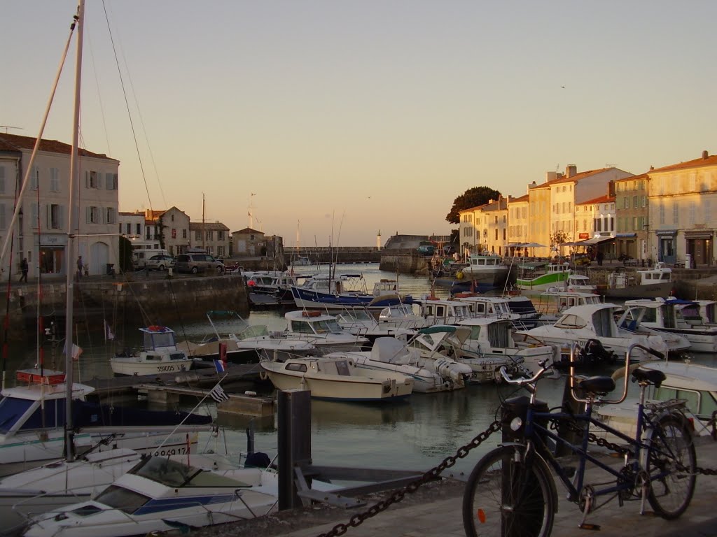 Harbour entrance sunset by rogermantell