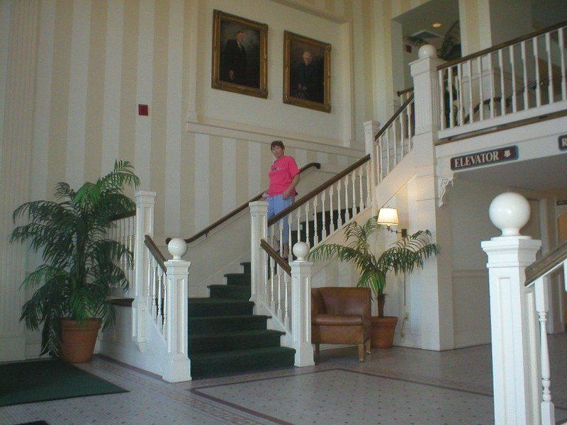 Mom descending stairs at Dunes Manor Hotel by MarkJWalter