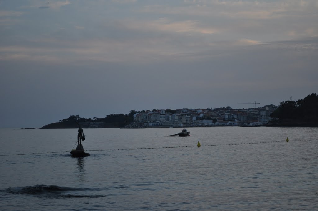 Faenando al atardecer en la playa de Silgar by fccosevilla