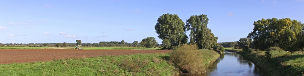 Working farmer in the area Münsterland, river Ems. by heico halbach