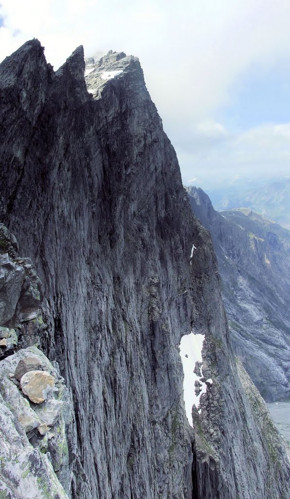 On the edge at Trollveggen by Henri Cloete