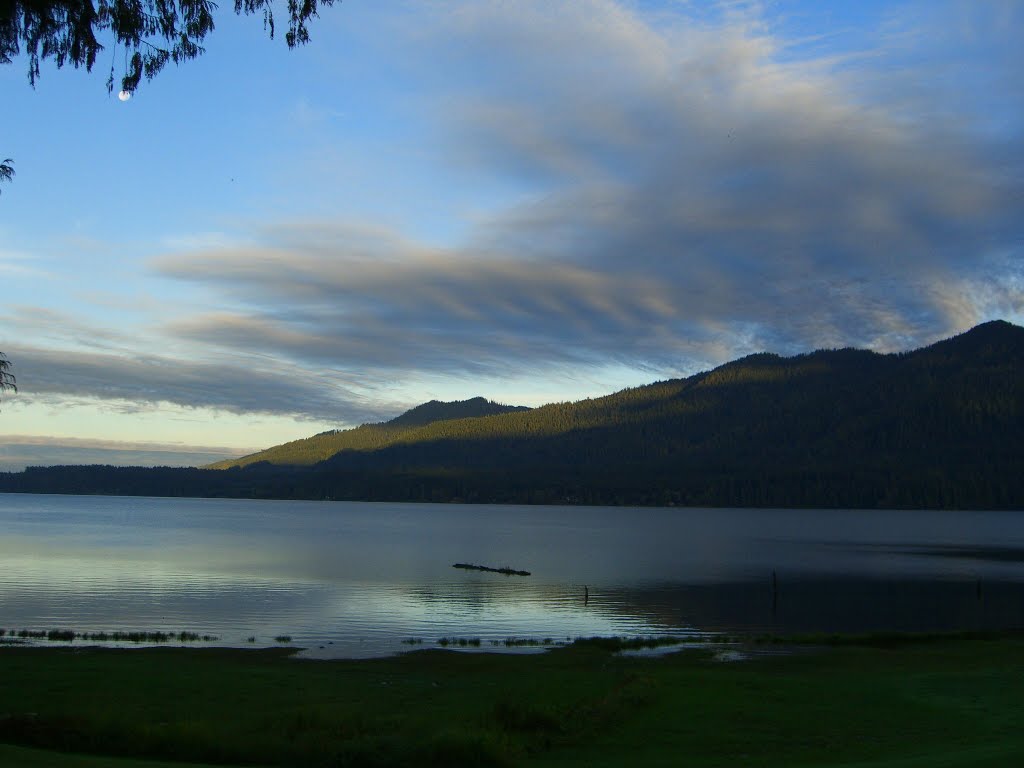 Quinault Lake, the sun peaking over the mountains behind me. by delightsnluv