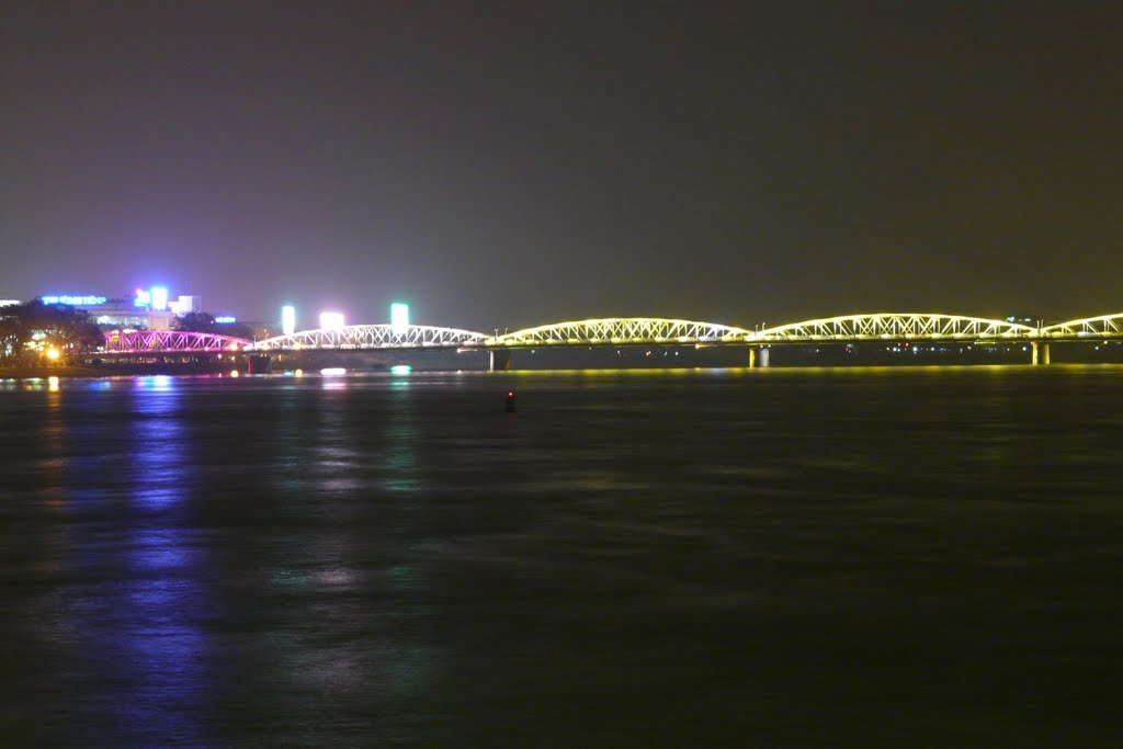 The bridge over the Perfume river at night by Joseph-Cro