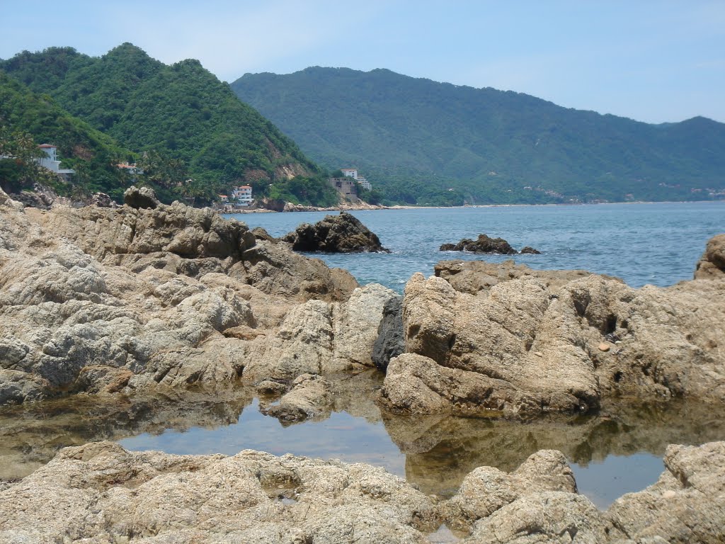 Beach below Costa Vida Restaurant by Amorissima