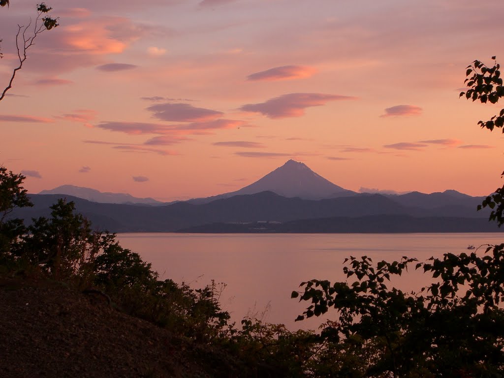 Russia, Kamchatka. Sunset over the Avacha Bay and the volcano Viliuchinsky. by Olga Yakovenko