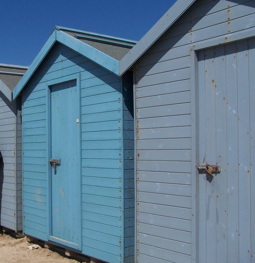 Charmouth Beach Huts by Ian Rowbotham