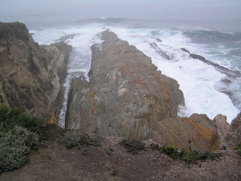 Rugged rocks in the surf by rwdw