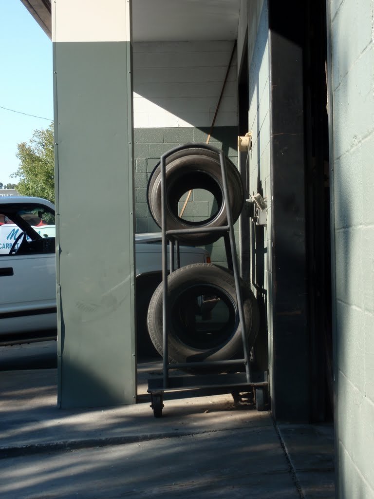 Tires on a rack behind North Hills Exxon, 10-11-10 by tompope2001