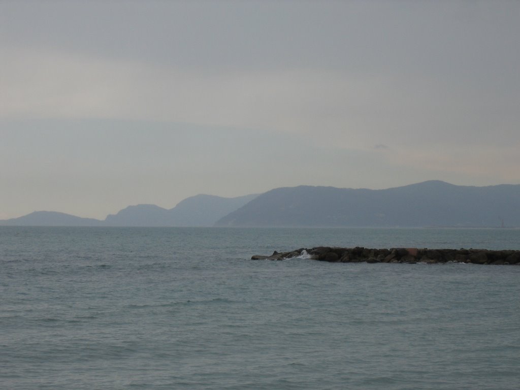 Looking out to Genova from Marina Di Massa on a rainy day by J.Lowe