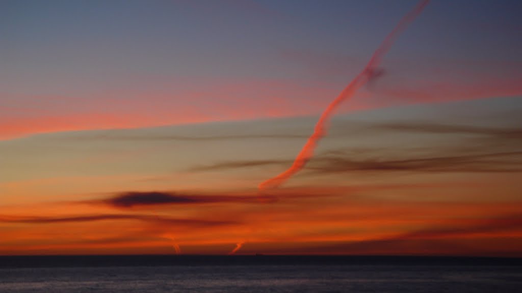 Contrail at Sunset by Craig Shier