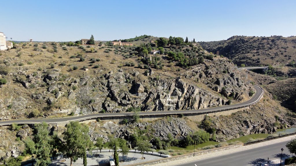 Winding road along river Tajo, Toledo by Colin W