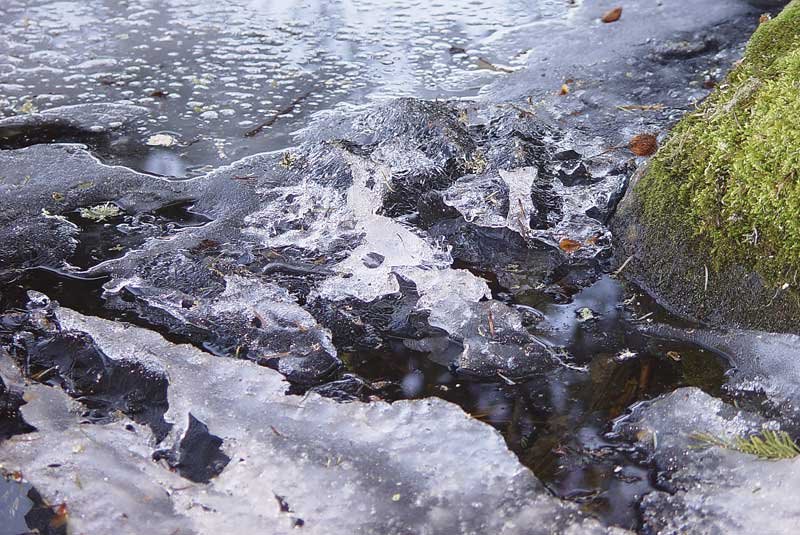 ice on lac Pavin by Philip LOUP