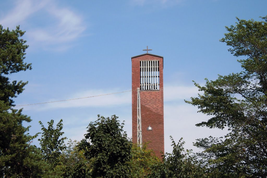 Zooming to the bell tower of the Catholic Church by Petteri Kantokari