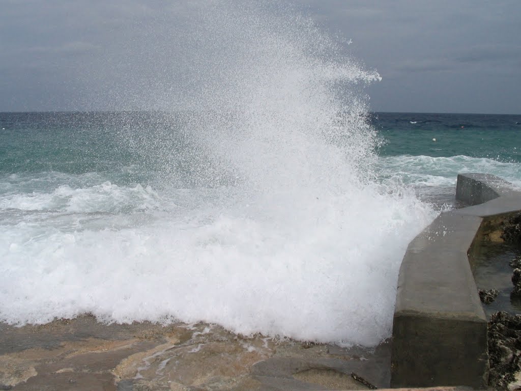 Storm on beach by John W. Berger