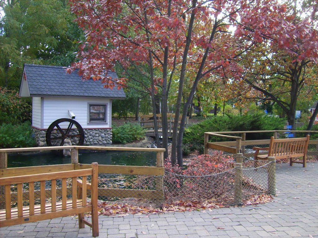 Pond area with a water wheel by Josh Bennett