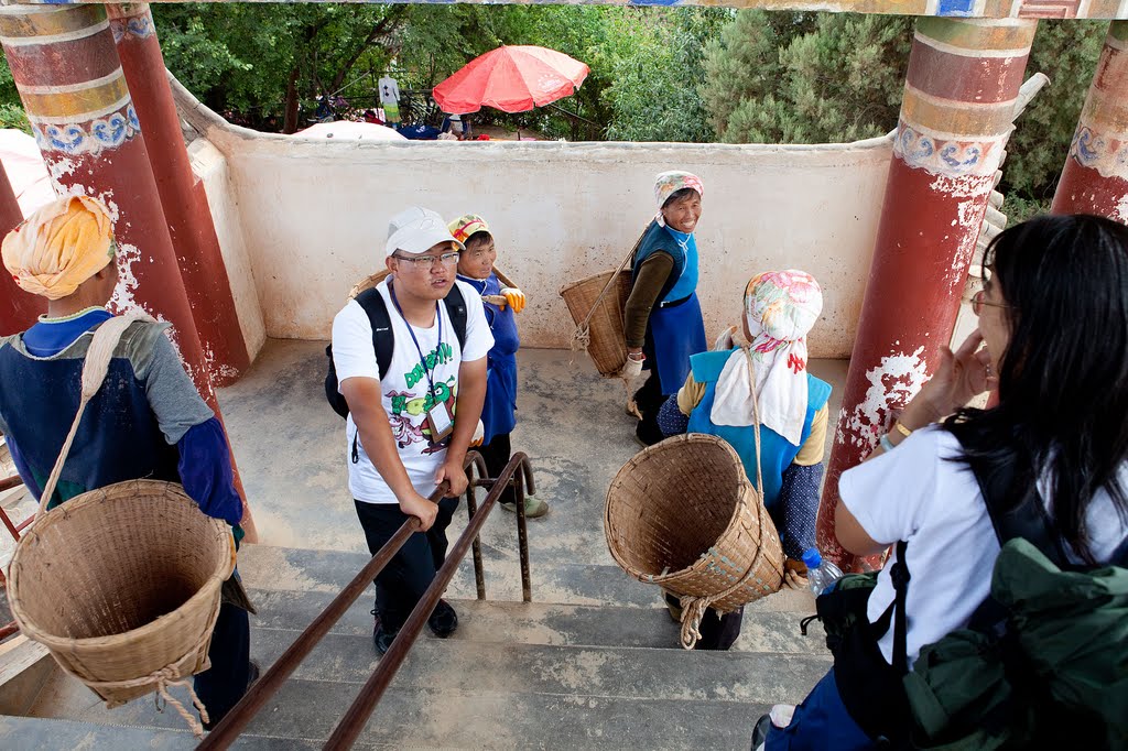 Bai workers returning for more tiles by waynebrink